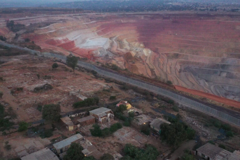 Life near the mining quarry is punctuated by permanent environmental disturbances: dust, earthquakes and collapsing or cracking walls. Image by Eric Cibamba.